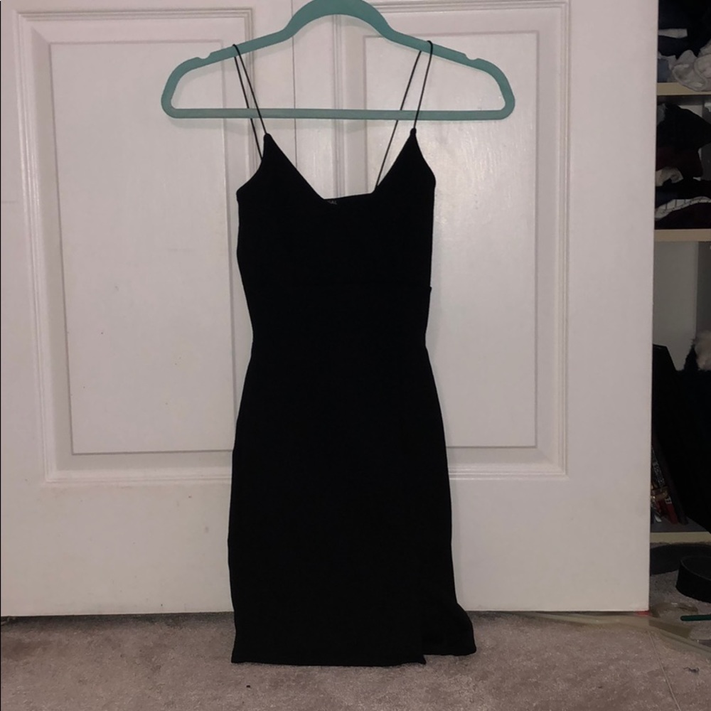 Strapy black dress from Nasty Gal